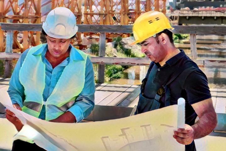 ADU construction in California with architect and contractor reviewing building plans